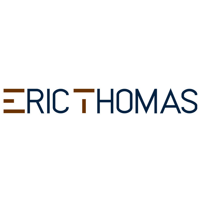 Eric Thomas brand logo.